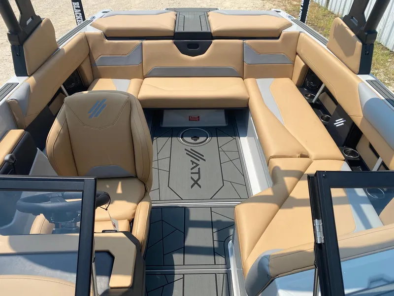 Slide: The Image of 2026 ATX Surf Boats 20 Type-S interior with tan seating and modern design. - 9