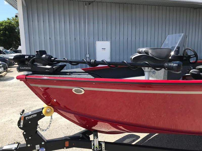 Slide: The Image of 2026 Lund 1800 Explorer SS boat trailer hitch on gravel surface. - 4