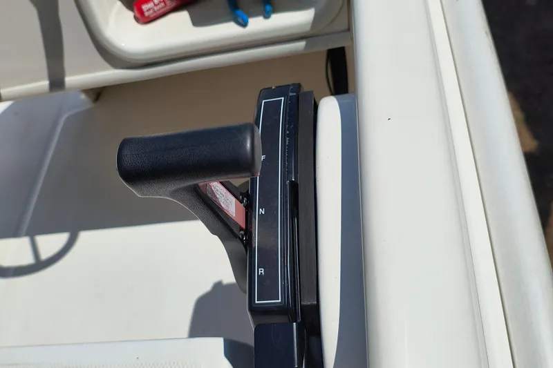 Slide: The Image of Throttle control of a 2016 Boston Whaler 130 Super Sport boat. - 6