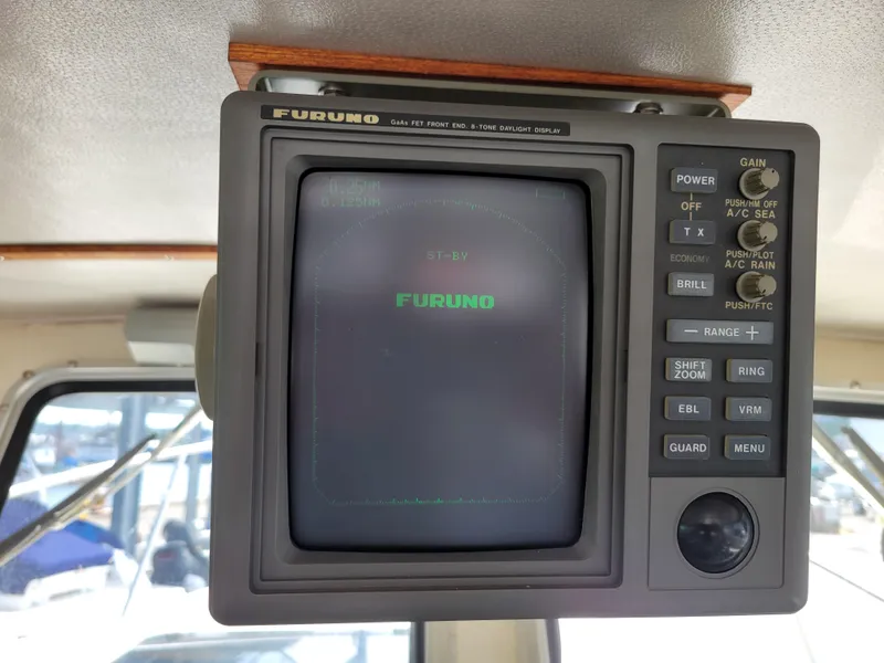Slide: The Image of Furuno radar display on 1999 SeaSport 2400 XL Limited boat dashboard. - 21