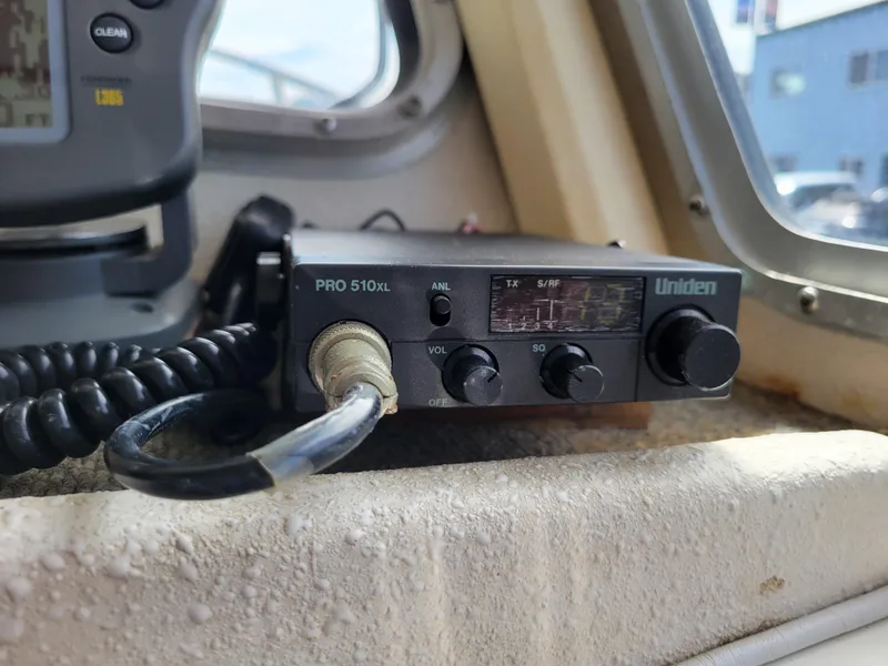 Slide: The Image of Uniden PRO 510XL radio inside a 1999 SeaSport 2400 XL Limited boat cabin. - 23
