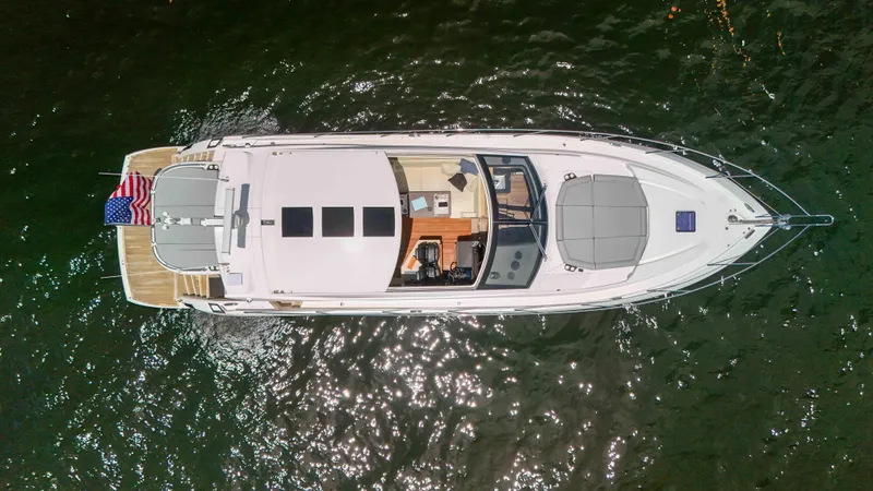 Slide: The Image of Aerial view of 2017 Sunseeker Predator 57 yacht on water. - 11