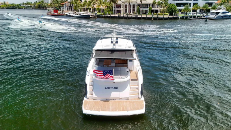 Slide: The Image of 2017 Sunseeker Predator 57 yacht cruising in a scenic waterway. - 22