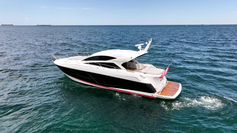 Slide: The Image of 2017 Sunseeker Predator 57 yacht cruising on open sea, showcasing sleek design and luxury. - 37