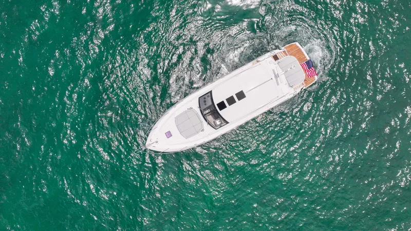 Slide: The Image of Aerial view of 2017 Sunseeker Predator 57 yacht cruising in turquoise waters. - 45