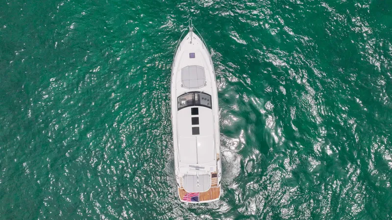 Slide: The Image of Aerial view of 2017 Sunseeker Predator 57 yacht cruising on turquoise waters. - 47