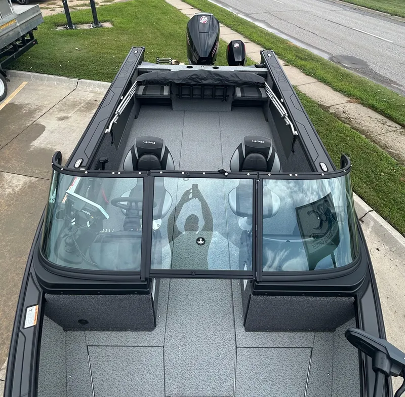 Slide: The Image of 2026 Lund 2075 Fisherman boat, top view, featuring spacious interior and modern design. - 16