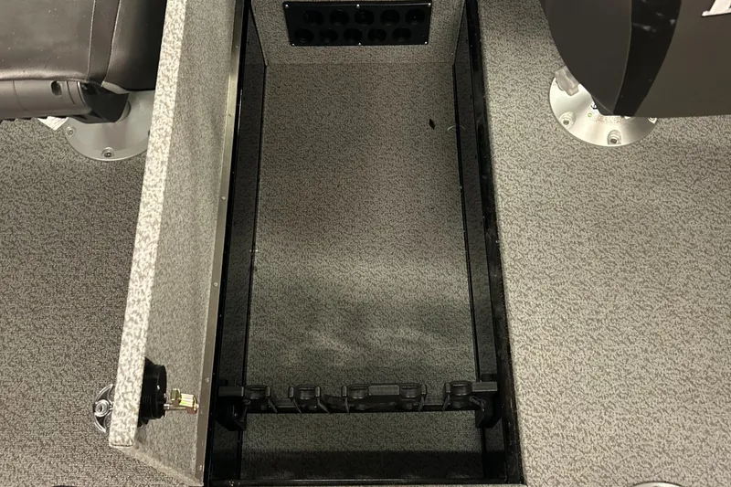 Slide: The Image of Open storage compartment in 2026 Lund 2075 Fisherman boat interior. - 22