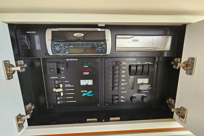 Slide: The Image of Control panel of 2001 Sea Ray 290 Amberjack boat with Clarion audio system. - 26