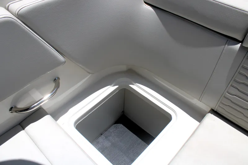 Slide: The Image of 2023 Sea Ray SPX 230 Outboard boat interior storage compartment. - 32