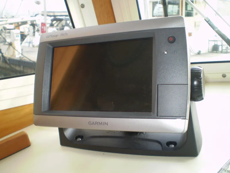 Slide: The Image of Garmin GPS device on 2001 Maple Bay 32' Trawler dashboard. - 15