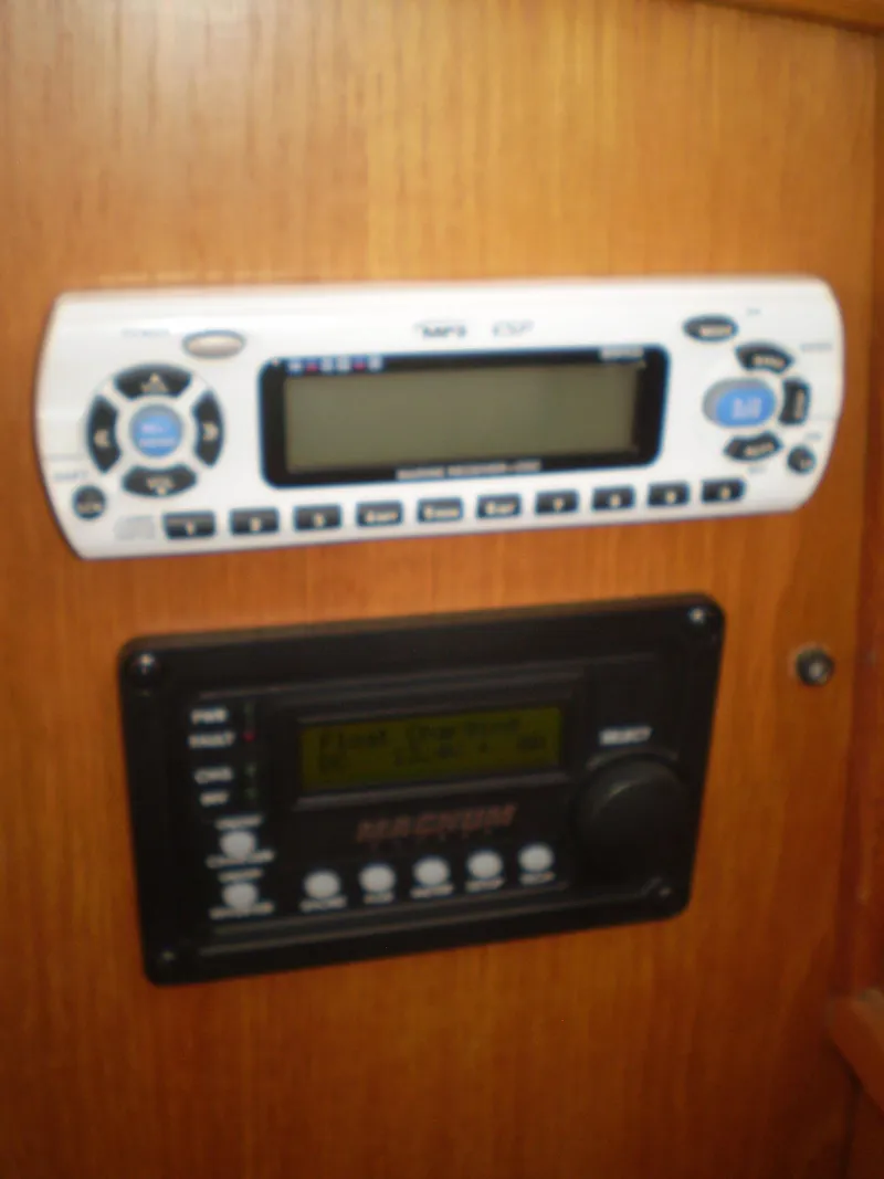 Slide: The Image of Control panel on a 2001 Maple Bay 32' Trawler boat interior. - 18