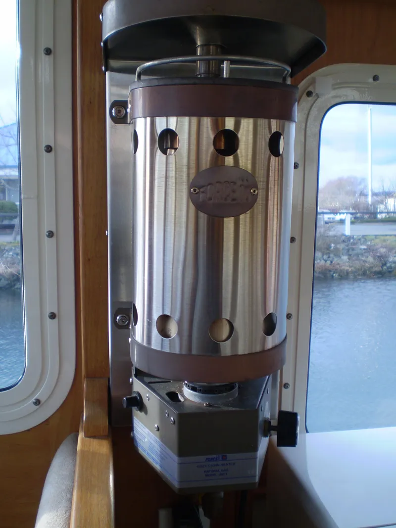 Slide: The Image of Stainless steel heater inside 2001 Maple Bay 32' Trawler boat cabin. - 23