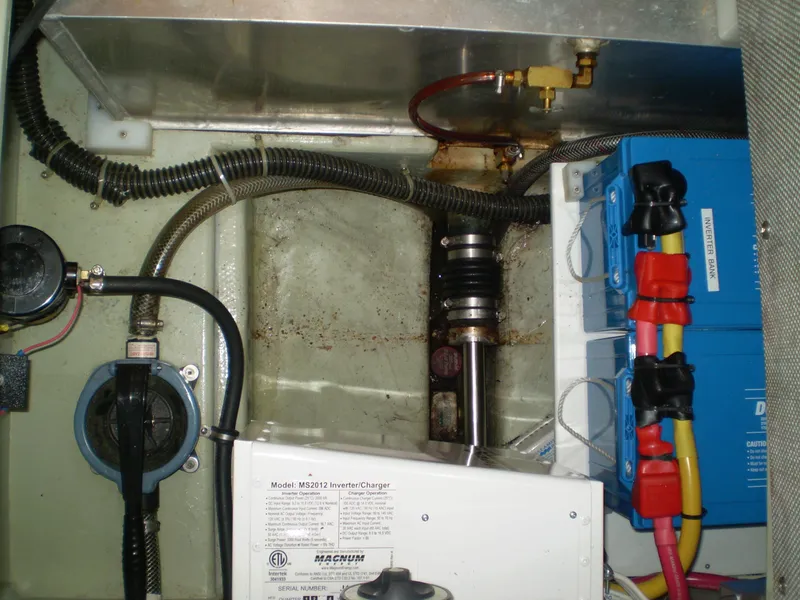 Slide: The Image of Engine room of 2001 Maple Bay 32' Trawler with visible wiring and components. - 26