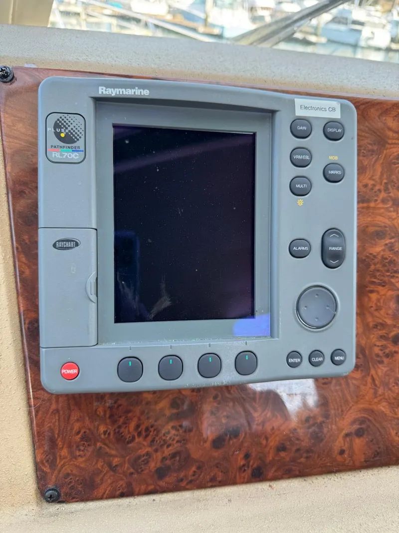 Slide: The Image of Raymarine electronics display on 2003 Meridian 490 Pilothouse Motor Yacht dashboard. - 24