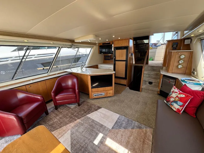 Slide: The Image of Luxurious interior of 2003 Meridian 490 Pilothouse Motor Yacht with modern furnishings. - 3