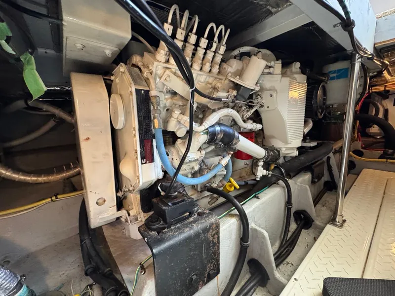 Slide: The Image of Engine room of 2003 Meridian 490 Pilothouse Motor Yacht, showcasing mechanical components. - 33