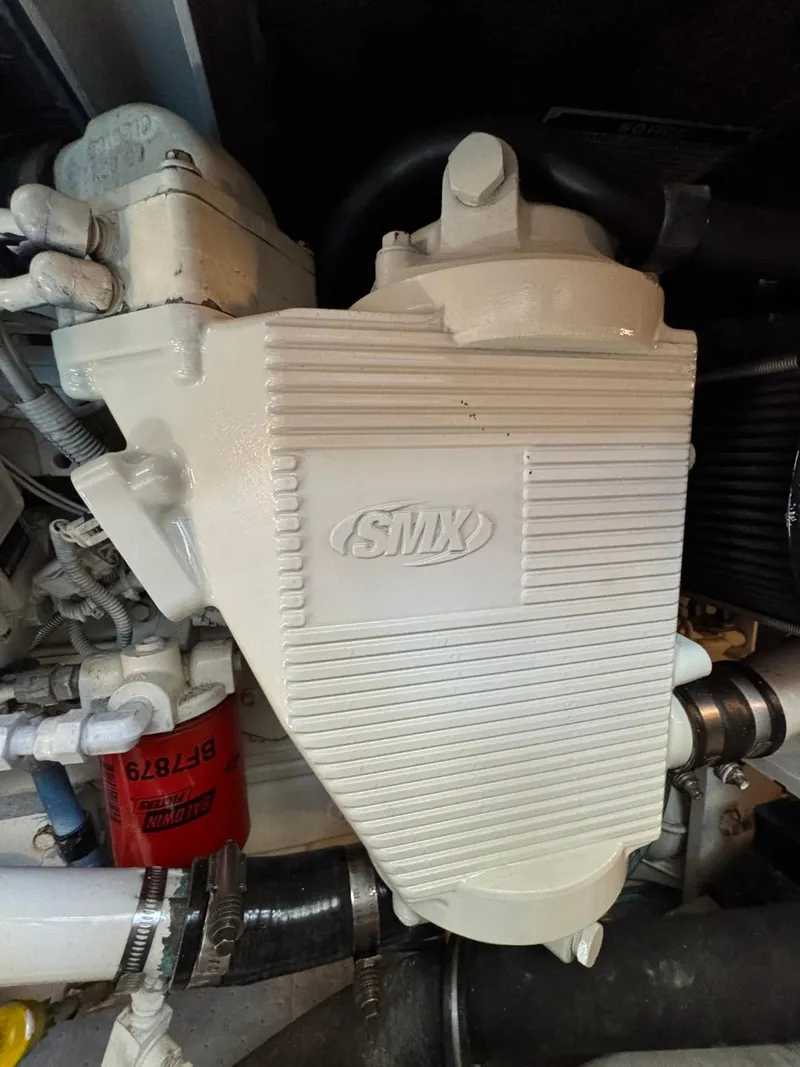 Slide: The Image of Engine component of 2003 Meridian 490 Pilothouse Motor Yacht, featuring SMX branding. - 34