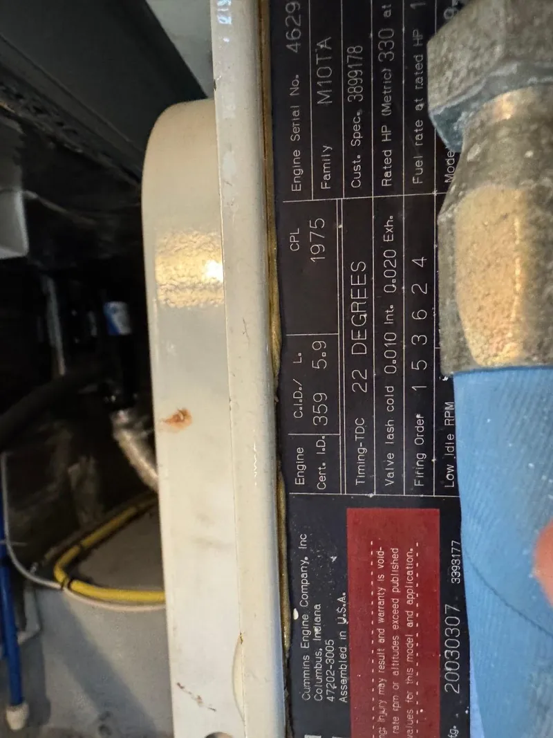 Slide: The Image of Engine specifications plate on a 2003 Meridian 490 Pilothouse Motor Yacht. - 39