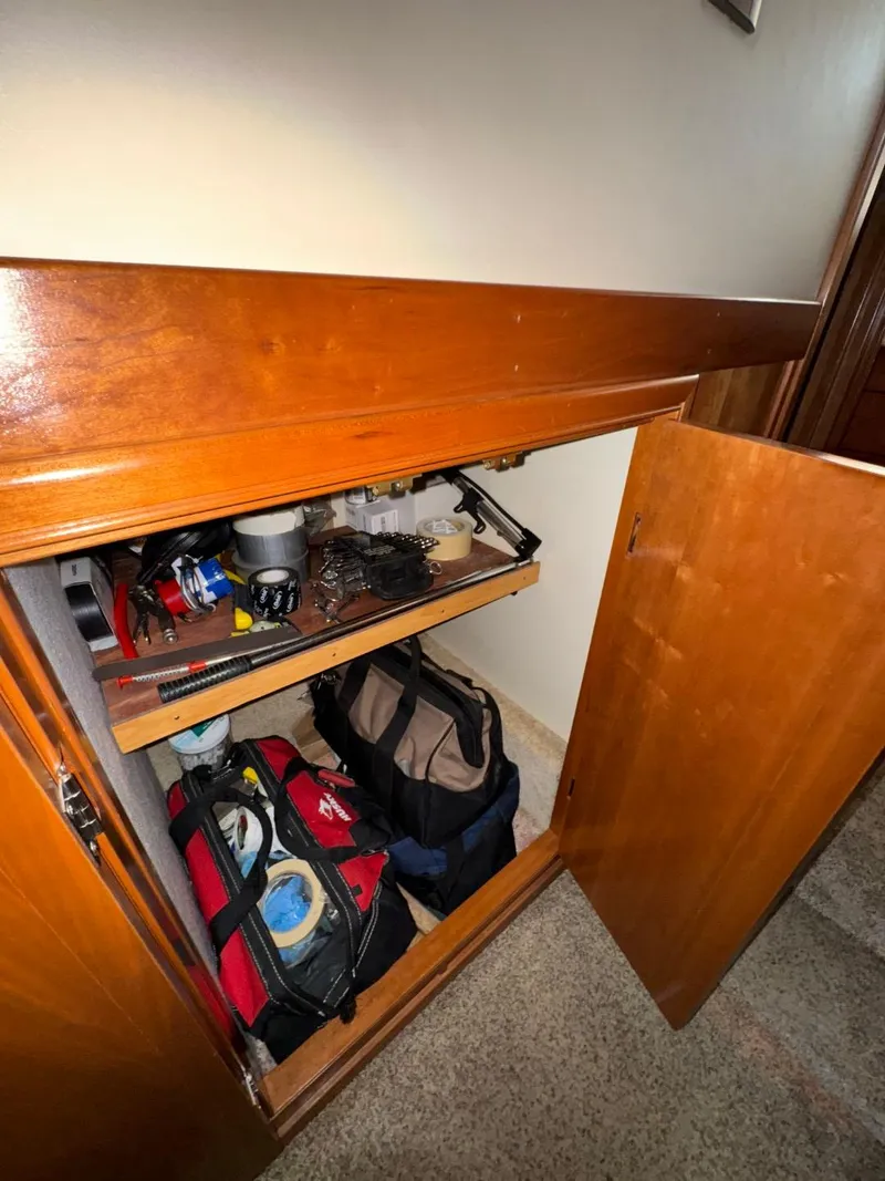 Slide: The Image of Storage cabinet with tools and supplies on a 2003 Meridian 490 Pilothouse Motor Yacht. - 45
