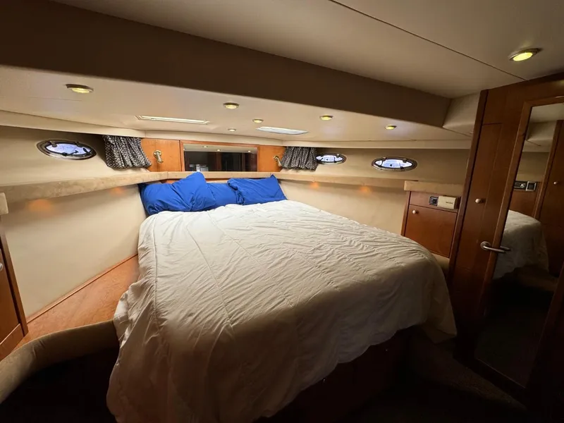 Slide: The Image of Luxurious bedroom in 2003 Meridian 490 Pilothouse Motor Yacht with cozy bedding. - 47