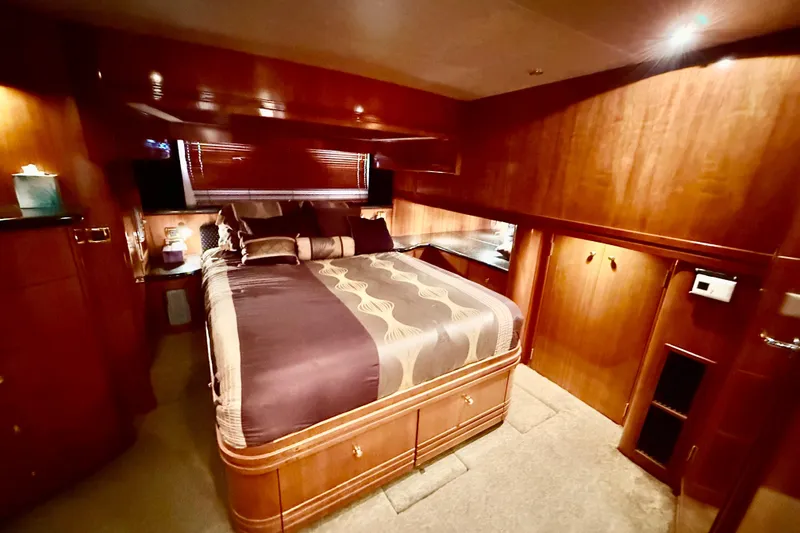 Slide: The Image of Luxurious bedroom interior of 2002 Carver 570 Voyager Pilothouse yacht. - 21