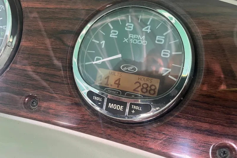 Slide: The Image of Close-up of 2008 Sea Ray 240 Sundeck tachometer showing 288 hours and 14 volts. - 20