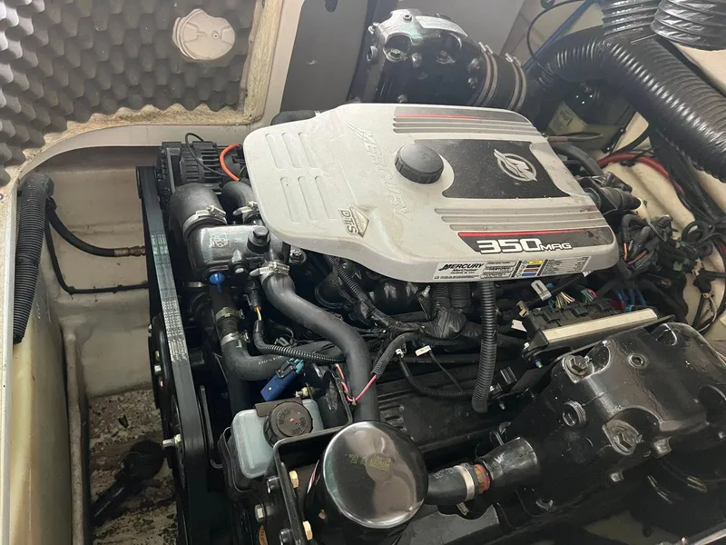 Slide: The Image of Engine of a 2008 Sea Ray 240 Sundeck with Mercury 350 MAG. - 28