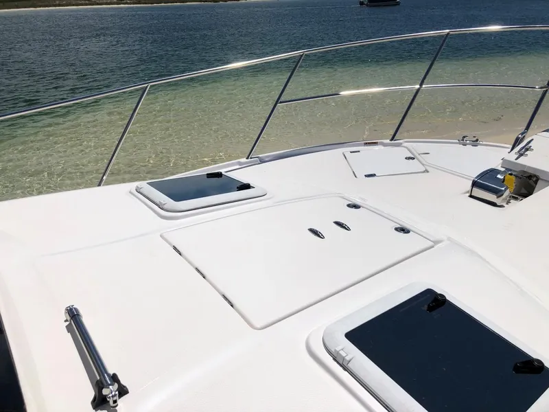 Slide: The Image of 2025 Cutwater C-32 Sedan yacht deck with ocean view. - 17