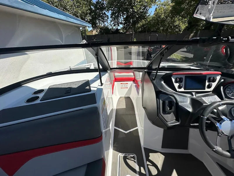 Slide: The Image of Interior of 2021 Supreme ZS212 boat with modern dashboard and seating. - 23
