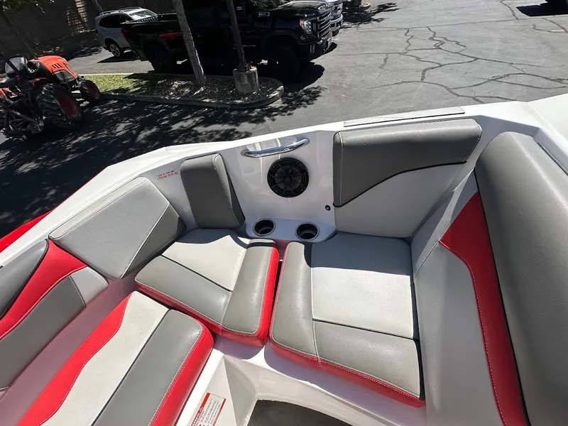 Slide: The Image of Interior of 2021 Supreme ZS212 boat with red and gray seating. - 26