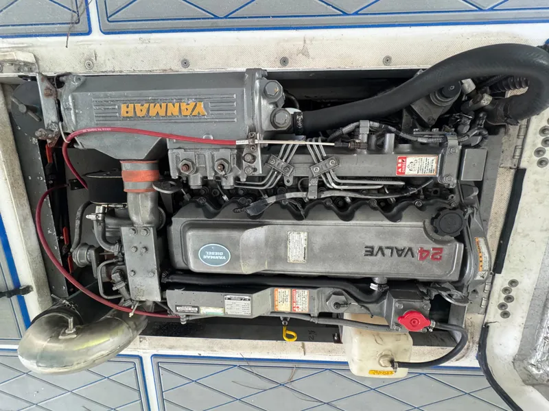 Slide: The Image of Yanmar diesel engine in 2012 Ocean Runner 290i boat, showcasing 24-valve configuration. - 21