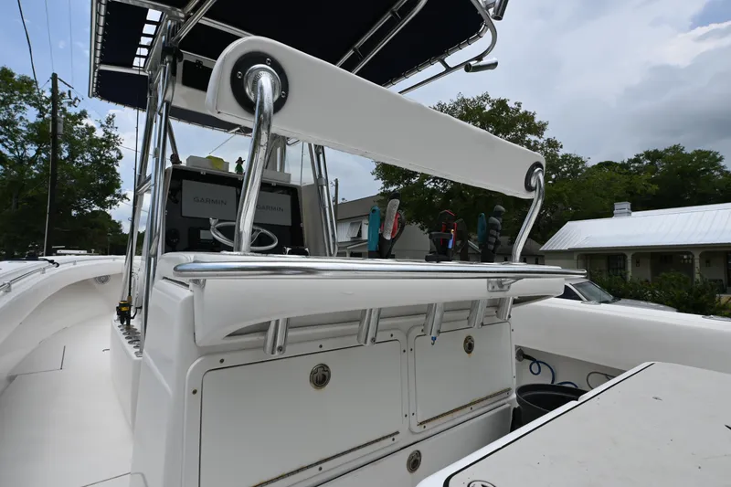 Slide: The Image of 2009 Contender 35 ST boat with fishing gear and Garmin electronics, docked outdoors. - 15