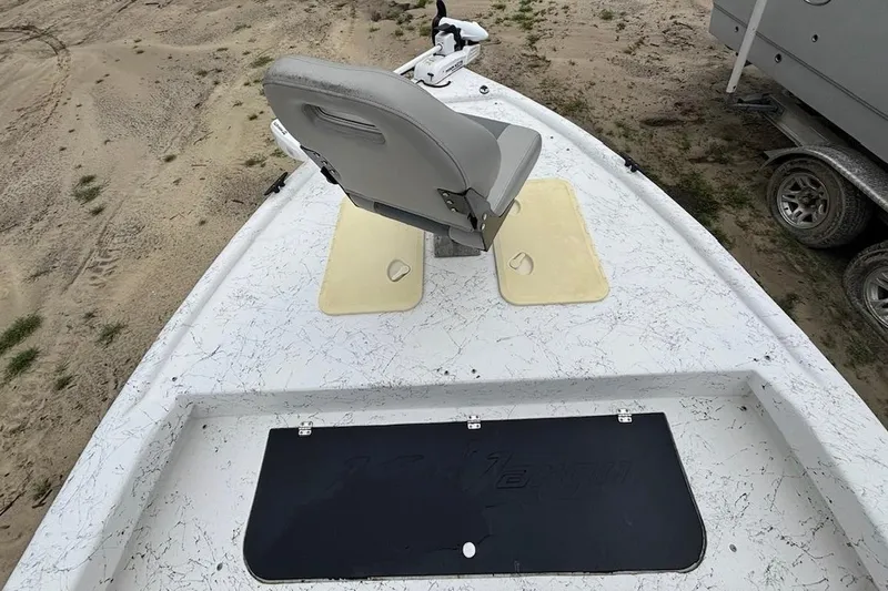 Slide: The Image of 2019 Key Largo 206 Bay boat deck with seating and storage compartments. - 8