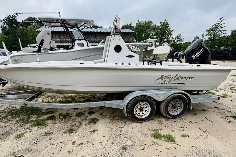 The Image of 2019 Key Largo 206 Bay boat on trailer, parked outdoors. - 0