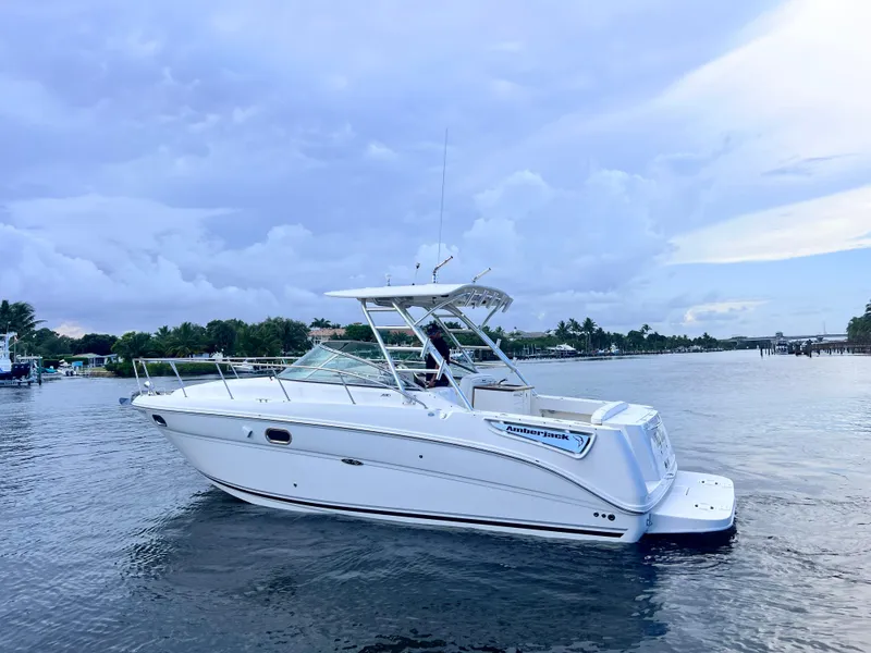 Slide: The Image of 2008 Sea Ray 290 Amberjack hull above water on a lift. - 5