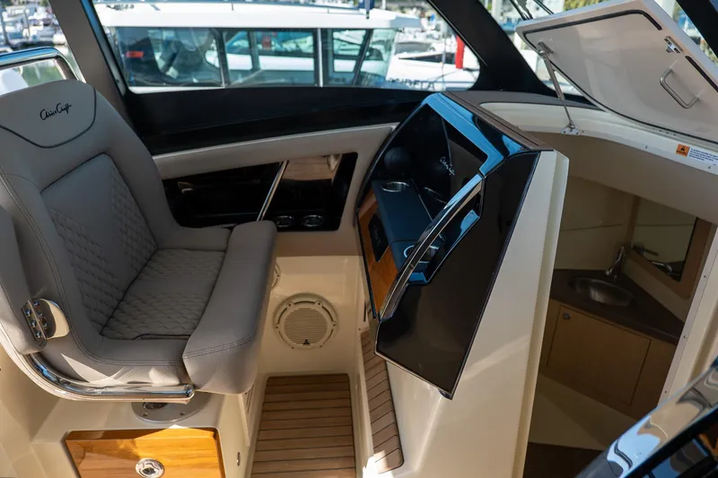 Slide: The Image of 2024 Chris-Craft Calypso 32 interior with luxurious seating and modern amenities. - 29
