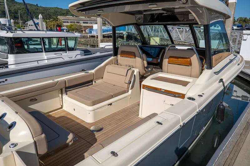 Slide: The Image of 2024 Chris-Craft Calypso 32 luxury boat with spacious seating and elegant design. - 30