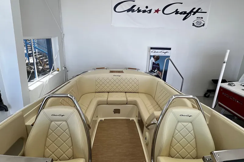 Slide: The Image of 2023 Chris-Craft Launch 27 boat interior with luxurious beige seating. - 11
