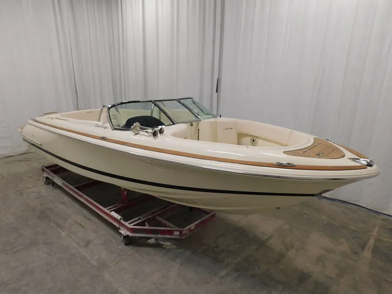 Slide: The Image of 2023 Chris-Craft Launch 27 boat in showroom. - 4