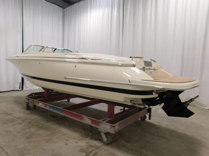 Slide: The Image of 2023 Chris-Craft Launch 27 boat in storage, side view. - 7