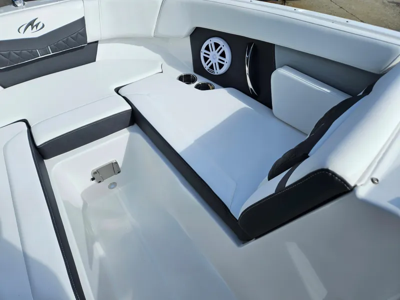 Slide: The Image of Interior of 2026 Monterey M-205 boat with white seating and speaker system. - 17