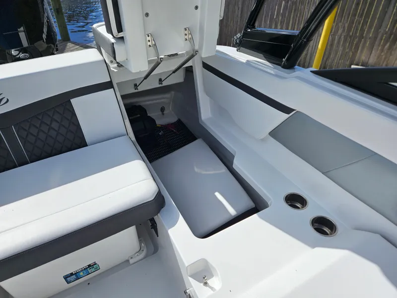 Slide: The Image of Interior of 2026 Monterey M-205 boat with seating and cup holders. - 23
