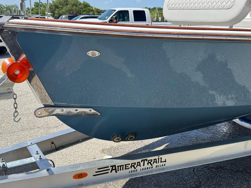 Slide: The Image of 2024 Dragonfly 21 Spanish Wells boat on AmeraTrail trailer, close-up view. - 29