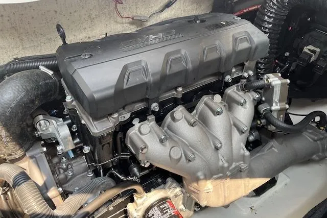 Slide: The Image of 2021 Yamaha Boats 275 SE engine compartment showcasing powerful motor components. - 27