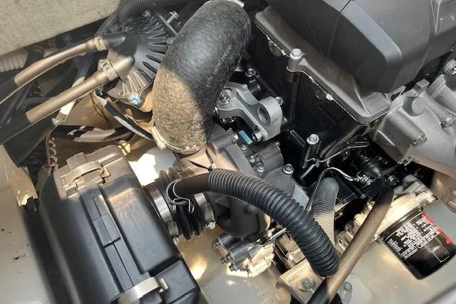 Slide: The Image of Engine compartment of 2021 Yamaha Boats 275 SE, showcasing intricate mechanical components. - 28