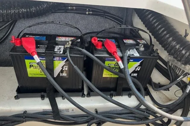 Slide: The Image of Batteries in a 2021 Yamaha Boats 275 SE, showing wiring and connections. - 29
