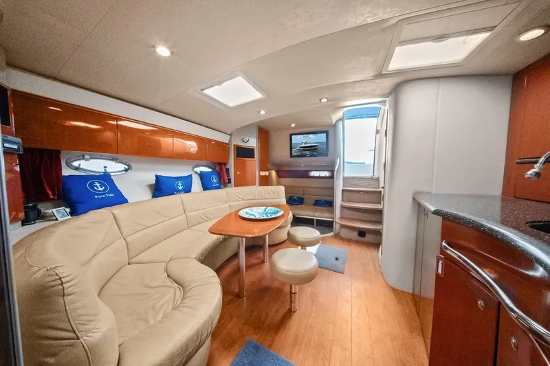 Slide: The Image of Luxurious interior of a 2008 Formula 40 Performance Cruiser with plush seating and modern amenities. - 10