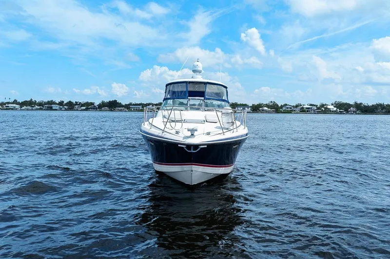 Slide: The Image of 2008 Formula 40 Performance Cruiser on open water under blue sky. - 19