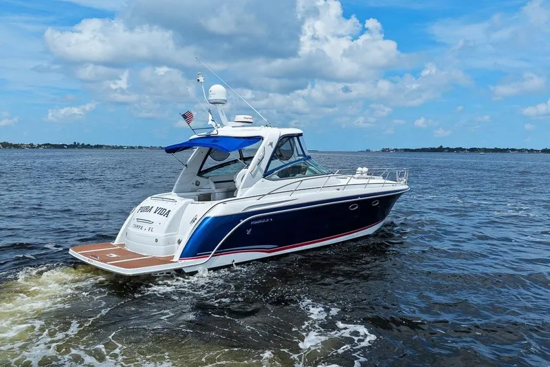 Slide: The Image of 2008 Formula 40 Performance Cruiser on open water under blue sky. - 26